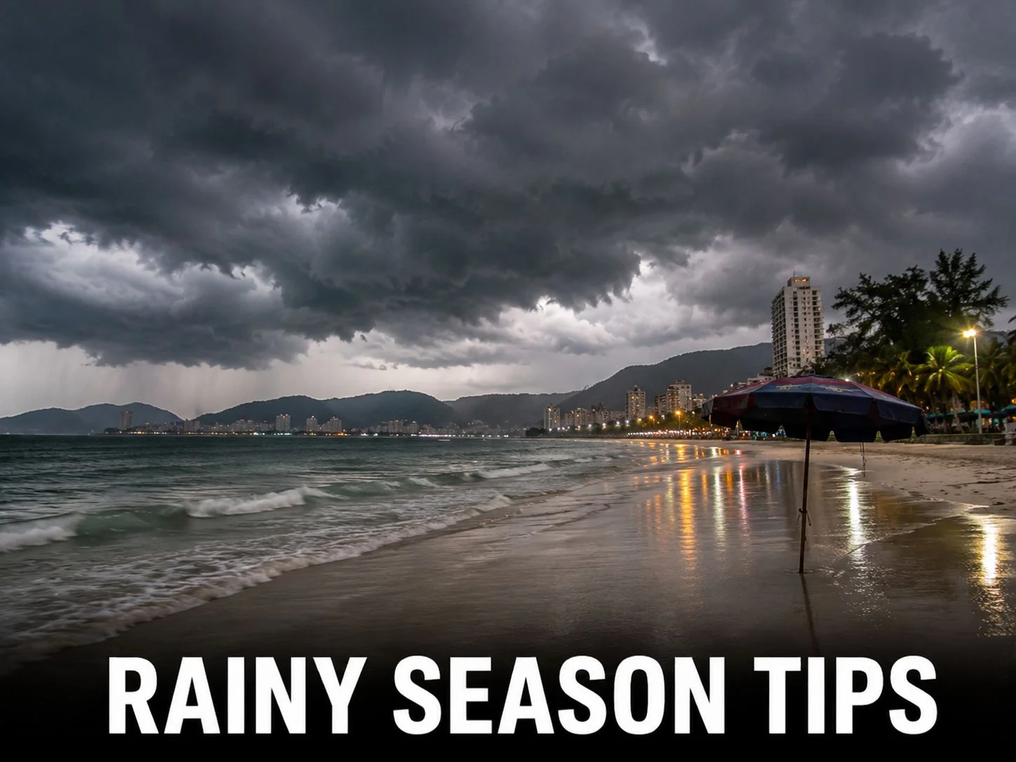 Patong Beach during rainy season with dramatic clouds over the Andaman Sea